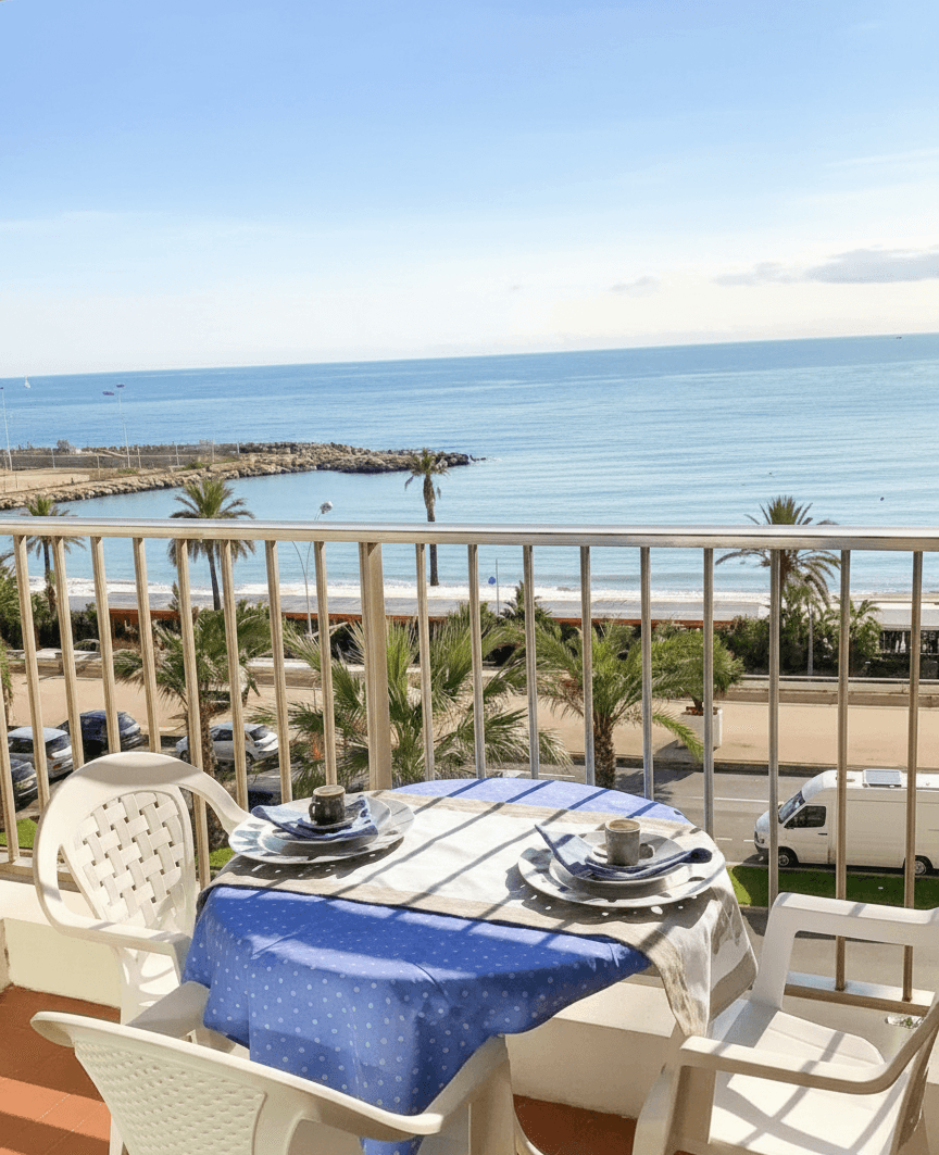 Private balcony with breakfast table and Mediterranean sea view in Menton