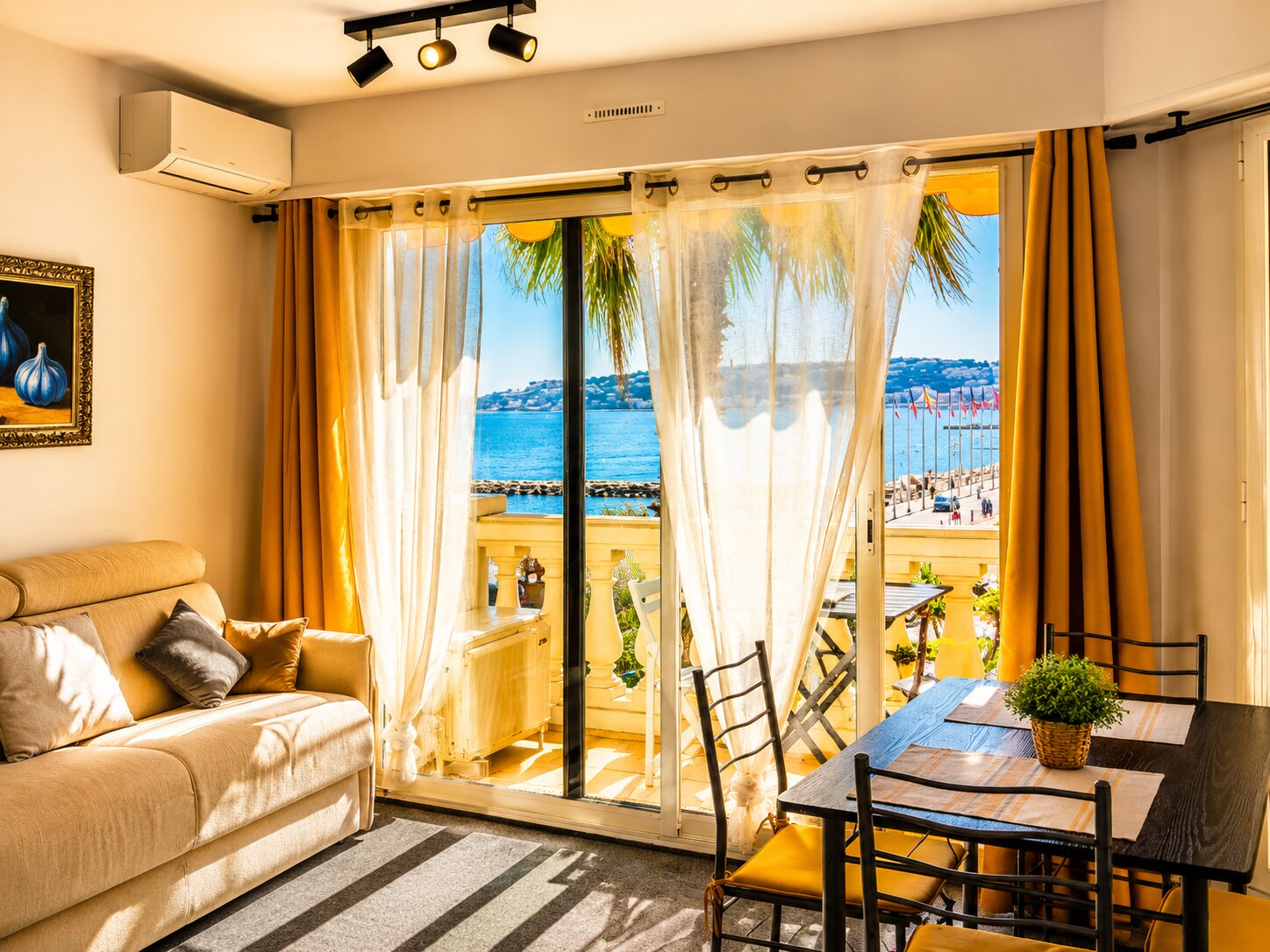 Living room with balcony view in the sea view studio